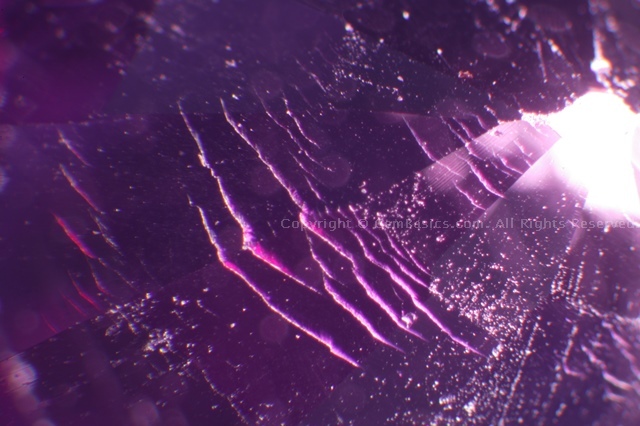 Surface cracks in Verneuil synthetic sapphire
